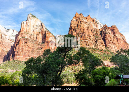 Springdale, USA - August 6, 2019: Zion National Park cliffs view at shuttle bus stop 4 in summer with people waiting to board in Utah Stock Photo