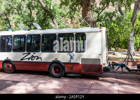 Springdale, USA - August 6, 2019: Zion National Park stop on road in Utah with closeup of window on shuttle bus public transportation in summer with s