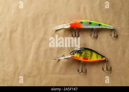 Top view of fishing lure isolated on a pink background Stock Photo - Alamy
