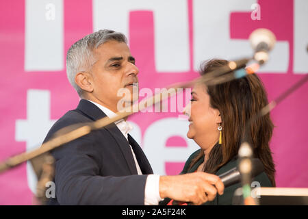 Westminster, London, UK. 19 October 2019. Political columnist Ayesha Hazarika welcomes on stage Sadiq Aman Khan, Mayor of London. Hundred of thousands supporters of the 'People's Vote' converge on Westminster for a ‘final say’ on the Prime Minister Boris Johnson’s new Brexit deal. MPs debate in the House of Commons the recently renegotiated Brexit deal. Politicians, alongside celebrities address the rally at Parliament Square. Stock Photo