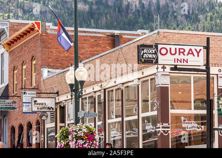 Ouray, USA - August 14, 2019: Small town in Colorado with city main street and hotel sign historic architecture stores shops Stock Photo