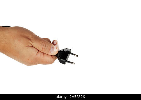 The hand is holding the electric fork. Stock Photo