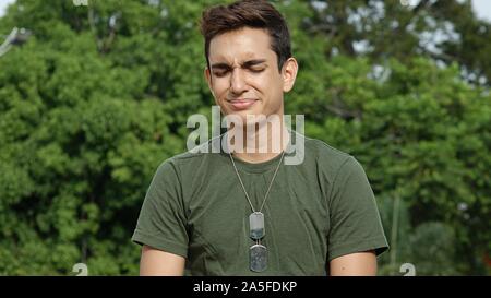 An Unhappy Young Male Soldier Stock Photo