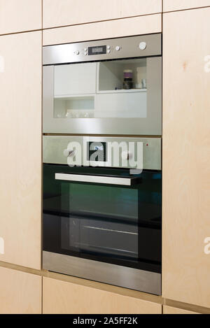 Interior of modern kitchen with built-in appliances Stock Photo