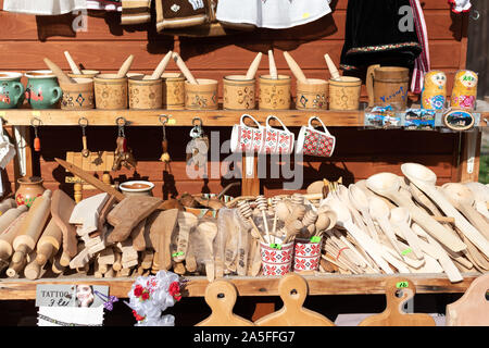 Bucovina, Romania, 15 September 2019 - Romanian souvenirs. Traditional clothing and accessories inside Romanian showroom souvenir shop in Bucovina Stock Photo