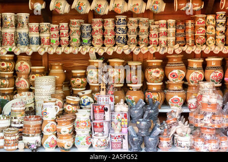 Bucovina, Romania, 15 September 2019 - Romanian souvenirs. Traditional clothing and accessories inside Romanian showroom souvenir shop in Bucovina Stock Photo