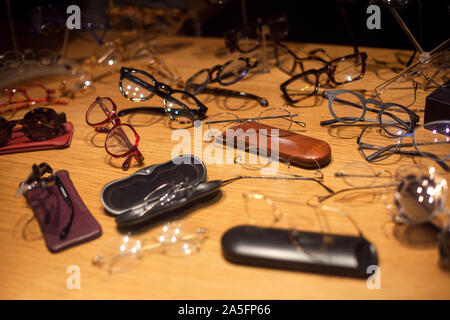 different stylish glasses on the showcase Stock Photo