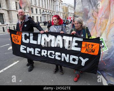 View of extinction rebellion protesters marching down Whitehall in London during a march on Friday 18 October 2019