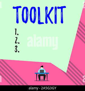 Text sign showing Toolkit. Business photo showcasing set of tools kept in a bag or box and used for a particular purpose Young man sitting on chair wh Stock Photo