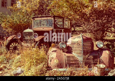 Abandoned automobiles in mining town in Nevada USA Stock Photo