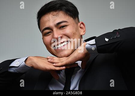 Colombian Business Man And Happiness Wearing Suit And Tie Stock Photo