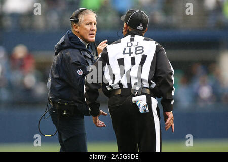 Seattle, WA, USA. 20th Oct, 2019. Seattle Seahawks head coach Pete Carroll talks to down judge Jim Mello during a game between the Baltimore Ravens and Seattle Huskies at CenturyLink Field in Seattle, WA. The Ravens defeated the Seahawks 30-16. Sean Brown/CSM/Alamy Live News Stock Photo