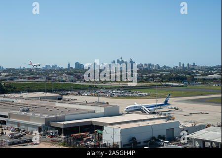 28.09.2019, Sydney, New South Wales, Australia - A view from Kingsford Smith International Airport across the apron towards the city skyline. Stock Photo