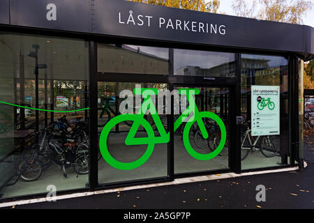 Umea, Norrland Sweden - October 11, 2019: locked parking for bicycles under roof Stock Photo