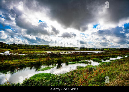 The winter-flooded valley of the Combe Haven river near Bexhill in East Sussex, England Stock Photo