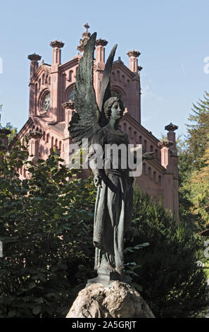 sculpture of the guardian angel at the main cemetery in frankfurt am main, germany Stock Photo