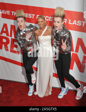 LOS ANGELES, CA. March 19, 2012: Tara Reid with Jedward (John & Edward Grimes) at the US premiere of her new movie 'American Reunion' at Grauman's Chinese Theatre, Hollywood. © 2012 Paul Smith / Featureflash Stock Photo