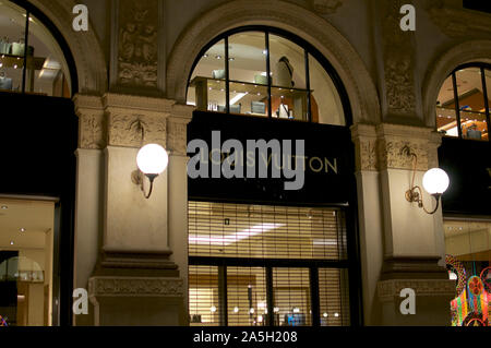Milan, Lombardy, Italy - 11th September 2019 : View of the shop entrance of Louis Vuitton in the Galleria Vittorio Emanuele II in Milan, Italy Stock Photo