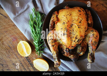 Roasted whole chicken or turkey for celebration and holiday. Christmas, thanksgiving, new year's eve dinner Stock Photo