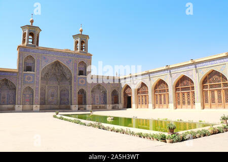 Pool in traditional courtyard of the Nasir al-Mulk Mosque (Pink Mosque) in Shiraz, Iran Stock Photo