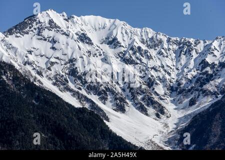 Mountain range Mount Hotaka with snow, mountain landscape in winter, Japanese Alps, Kamikochi, Nagano, Japan Stock Photo