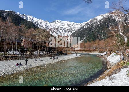 Bridge over Azusa River, Mount Yake, Japanese Alps, Kamikochi, Matsumoto, Nagano, Japan, snow covered in the background Stock Photo