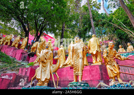 Statues of Buddha and arhats (Buddhist equivalent of saints) at Ten Thousand Buddhas Monastery (Man Fat Sze). Sha Tin, New Territories, Hong Kong. Stock Photo