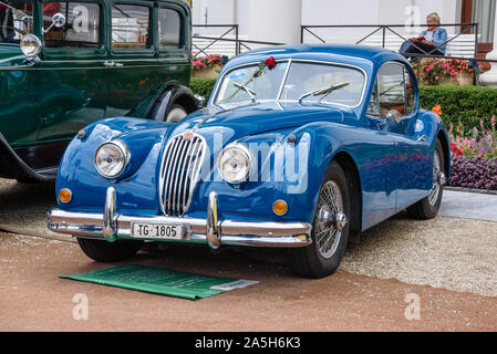 BADEN BADEN, GERMANY - JULY 2019: blue JAGUAR XK XK120 sports coupe, oldtimer meeting in Kurpark. Stock Photo