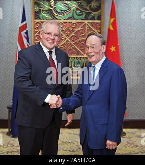 Jakarta, Indonesia. 20th Oct, 2019. Chinese Vice President Wang Qishan meets with Australian Prime Minister Scott Morrison in Solo, Indonesia, Oct. 20, 2019. Chinese Vice President Wang Qishan on Monday wrapped up a friendly visit to Indonesia as a special envoy of Chinese President Xi Jinping. During the trip, which started Friday, Wang attended the inauguration ceremony of Indonesian President Joko Widodo for his second term. Credit: Zhang Ling/Xinhua/Alamy Live News Stock Photo