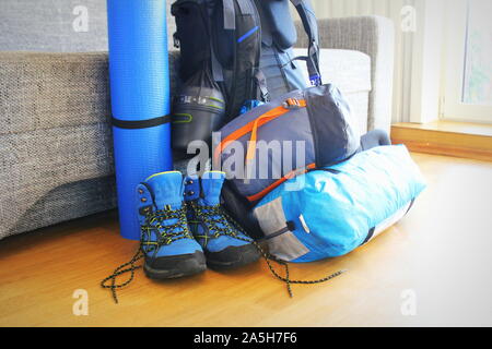 Composition with camping equipment on wooden background Stock Photo