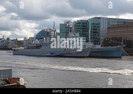 The Brazilian Navy Training Ship U27, moored alongside HMS Belfast on the River Thames in London, England. Stock Photo