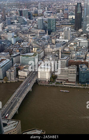 An aerial view looking north over London Bridge across the River Thames in London. Stock Photo