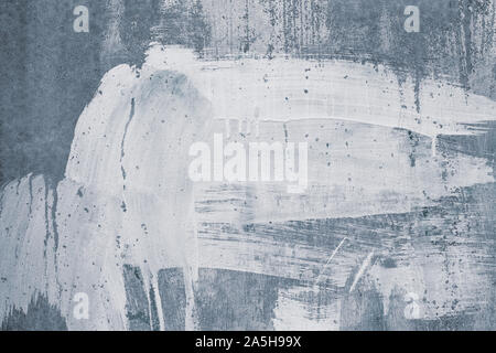 Abstract grunge wall. Space texture. Modern architecture background, art design. White spots, paint stains on gray concrete surface. Stock Photo
