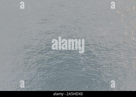 Silver reflective texture for background. Sheet of a foil surface scratches and shadows Stock Photo