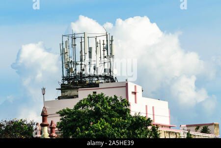 Heavy High Voltage Electric Power Transmission Cell Tower radio Antenna. Broadcast Steel beam tower cellular antenna. Industrial energy power design. Stock Photo