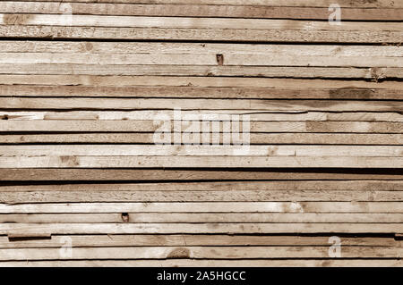 Stack of many Obsolete plywood hardwood plank timber stacked in a row. Abstract texture background. Copy Space Stock Photo