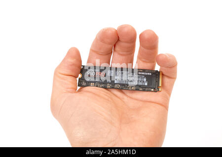 Circuit Board of an SSD held in hand Stock Photo
