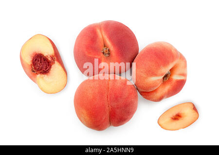 Ripe chinese flat peach fruit with leaf isolated on white background. Top view. Flat lay Stock Photo