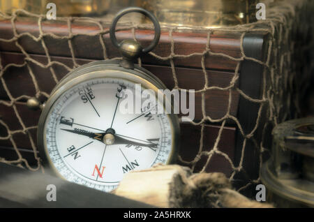 Vintage compass standing on old map Stock Photo - Alamy