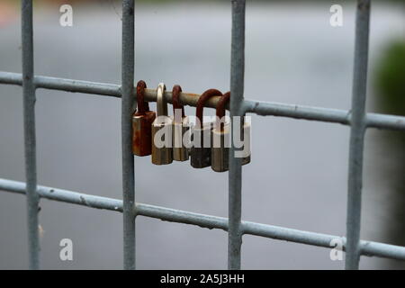 A bunch of locks attached to a bridge in Yorkshire. Stock Photo