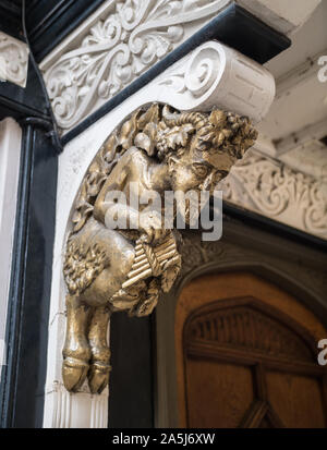 Faun that supposedely inspired C. S. Lewis for the Narnia character Mr. Tumnus. Door entrance. Located on St Mary's passage in Oxford (United Kingdom. Stock Photo