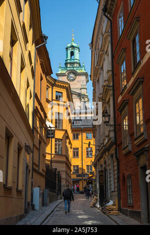 Stockholm Old Town, view in summer of people in Stora Gramunkegrand, a street in the Old Town (Gamla Stan) area of Stockholm city center, Sweden. Stock Photo