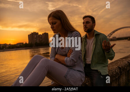 Young couple having troubles in their relationship. Stock Photo