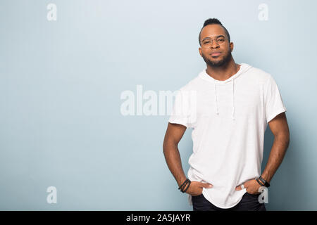 African American man in glasses posing in studio Stock Photo