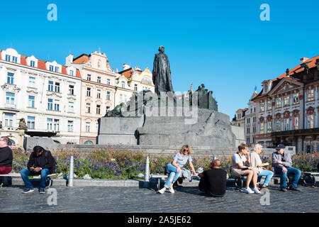 PRAGUE, CZECH REPUBLIC - OCTOBER 14, 2018: A view of the Old Town Square in Prague, Czech Republic, highlighting the Jan Hus Monument in the foregroun Stock Photo