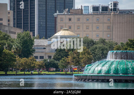 Orlando, Florida. October 12, 2019. Partial view of Memorial fountain and St. George Church in downtown area 51 Stock Photo