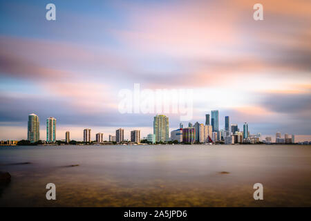 Miami, Florida, USA downtown skyline on Biscayne Bay in early evening. Stock Photo