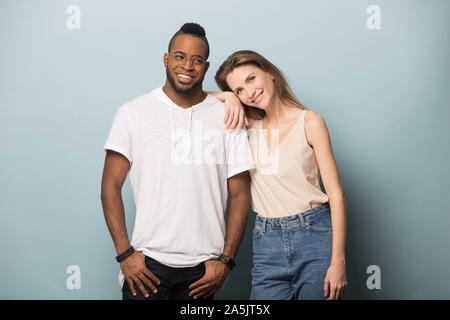Portrait of smiling multiethnic couple hug posing for picture Stock Photo