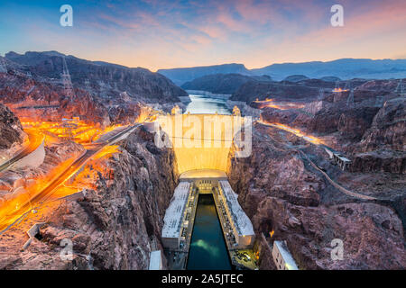 Hooover Dam on the Colorado River straddling Nevada and Arizona at dawn. Stock Photo
