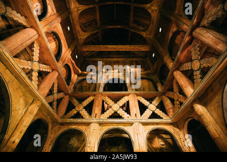 Borgund, Norway - June 14, 2019: Interior Of Famous Wooden Norwegian Landmark Stavkirke. Ancient Old Wooden Triple Nave Stave Church. Stock Photo